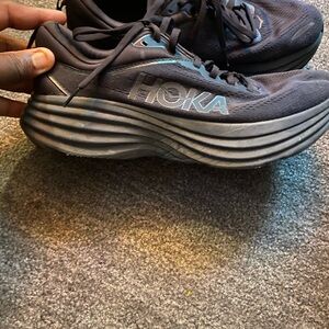 Hoka Black Athletic Shoes with Blue Insole Accent